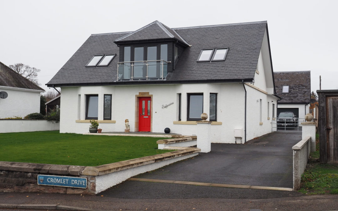 Large house renovation & extension in Invergordon with a double garage with attic trusses